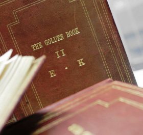 One of the four volumes of The Golden Book.